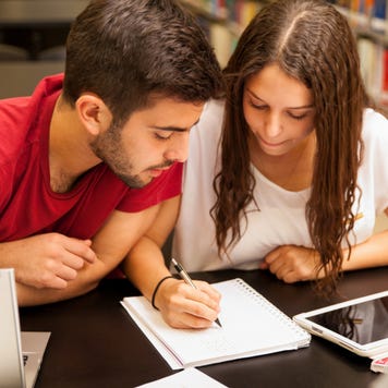 Group of students study together