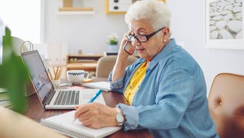 senior woman on the phone at home
