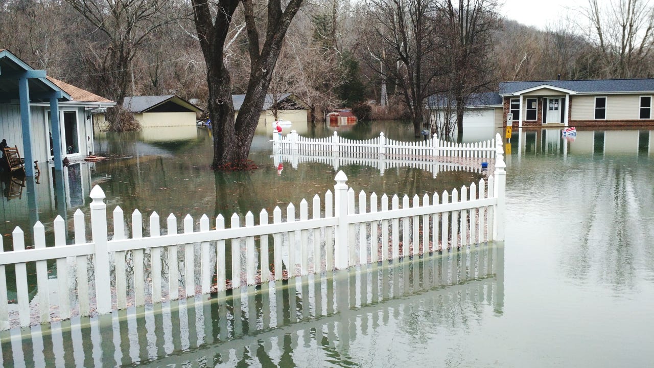 Flooded home and yard