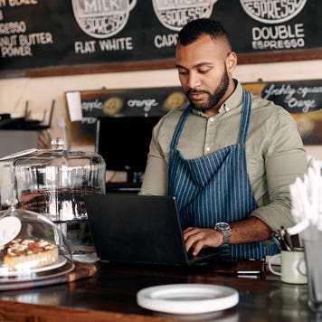 barista on a computer
