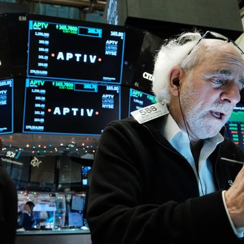 A trader watches the market at the New York Stock Exchange