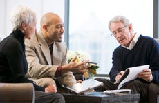 A financial advisor works with an older couple