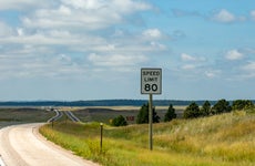 Speed limit 80 MPH sign on interstate 90 in Wyoming