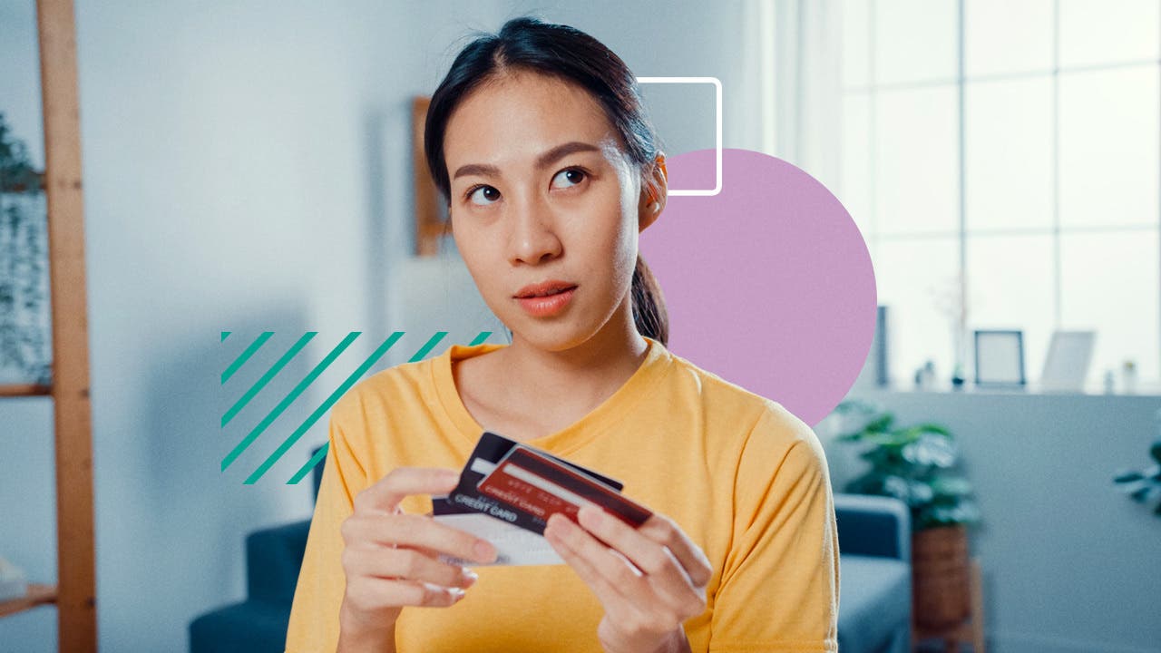 design element of a women holding multiple credit cards and looking to the side