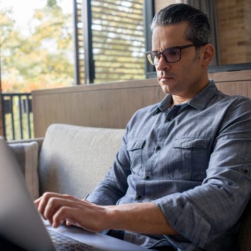 Man working from home on his laptop computer