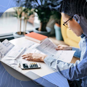 A man looks at his finances.