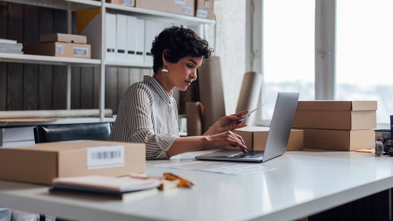 woman doing business at desk