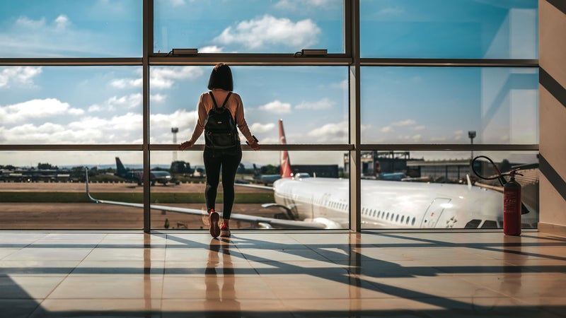 woman standing in airport
