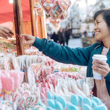 woman purchasing from street vendor
