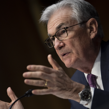 Federal Reserve Chair Jerome Powell speaks with lawmakers at a congressional testimony