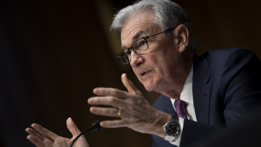 Federal Reserve Chair Jerome Powell speaks with lawmakers at a congressional testimony