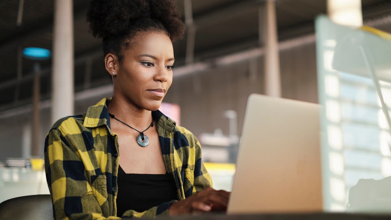 Woman works on a laptop