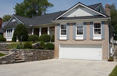A bungalow-style home with attached two-car garage