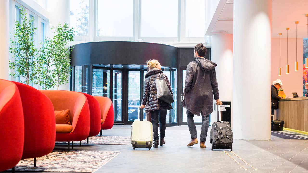 couple walking in hotel lobby