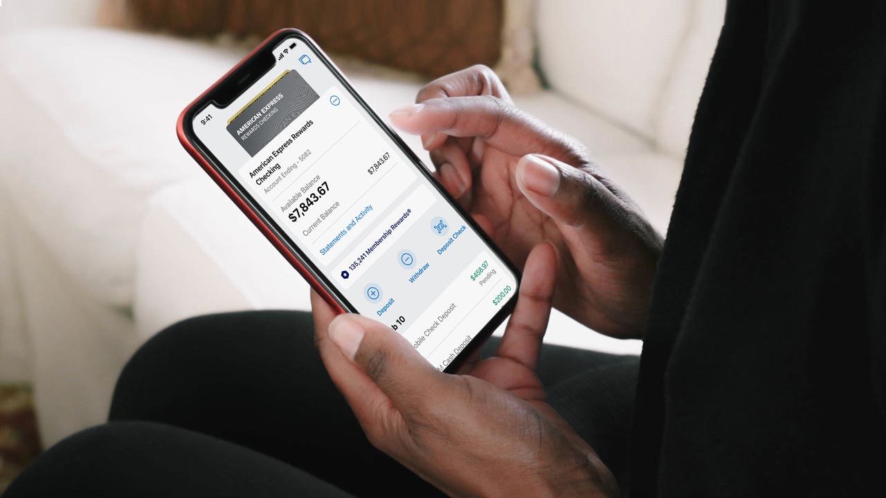 person looking at american express digital checking account on phone
