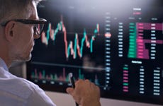 Man analyzes stock market