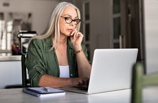 Senior woman working on a laptop