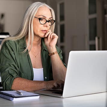 Senior woman working on a laptop