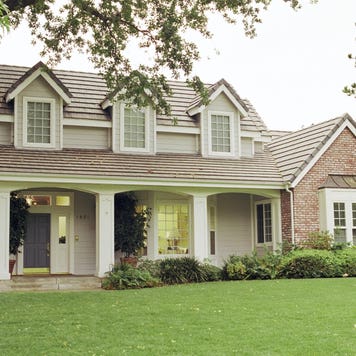 A sigle-family home with front yard