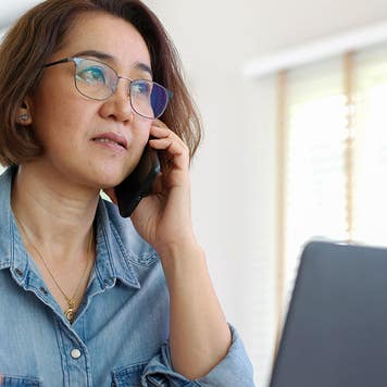 concerned woman talking on the phone