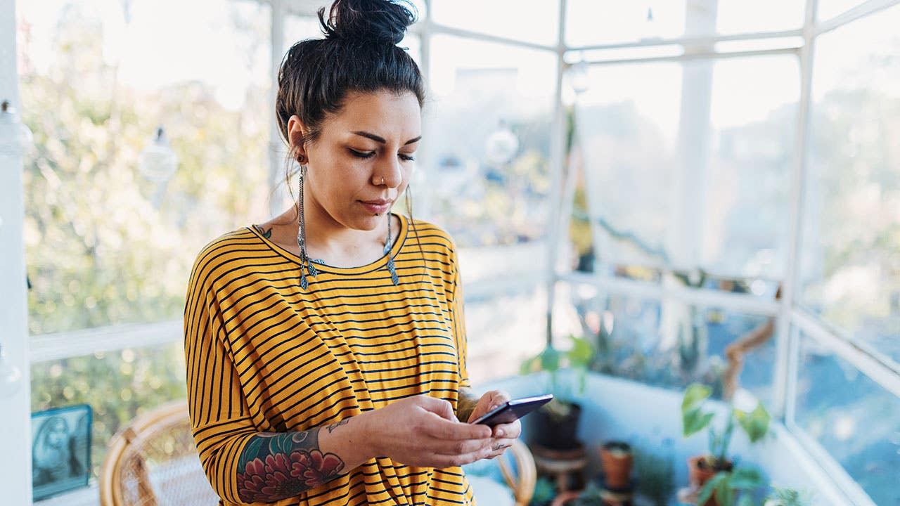 woman using smartphone