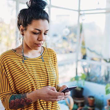 woman using smartphone