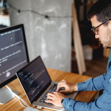 Man works on programming