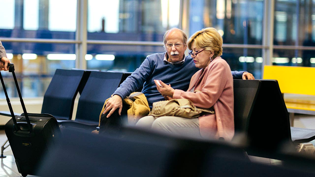 senior couple at the airport