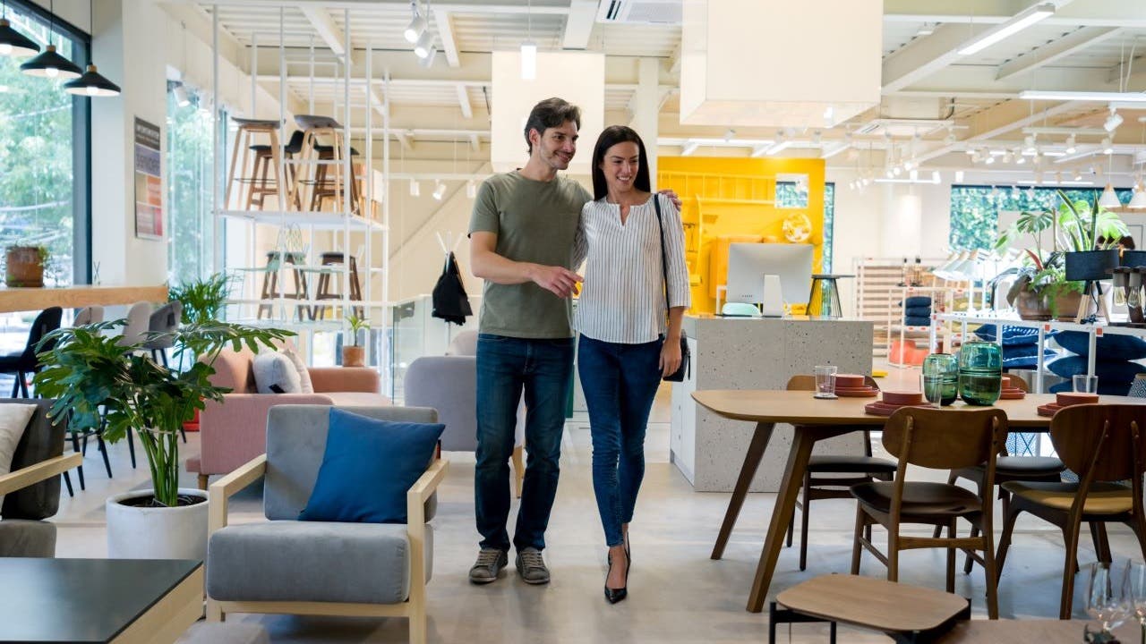 Couple looking at items in a furniture store