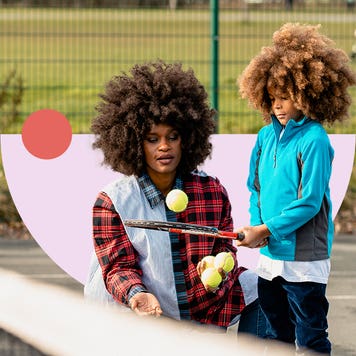 Young child and their parent practicing tennis on a tennis court with illustrated graphics
