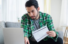 Man looks through a loan application