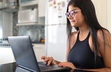 young woman using a laptop