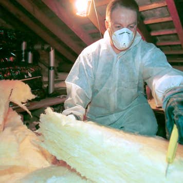 DIY drywall with protective clothing