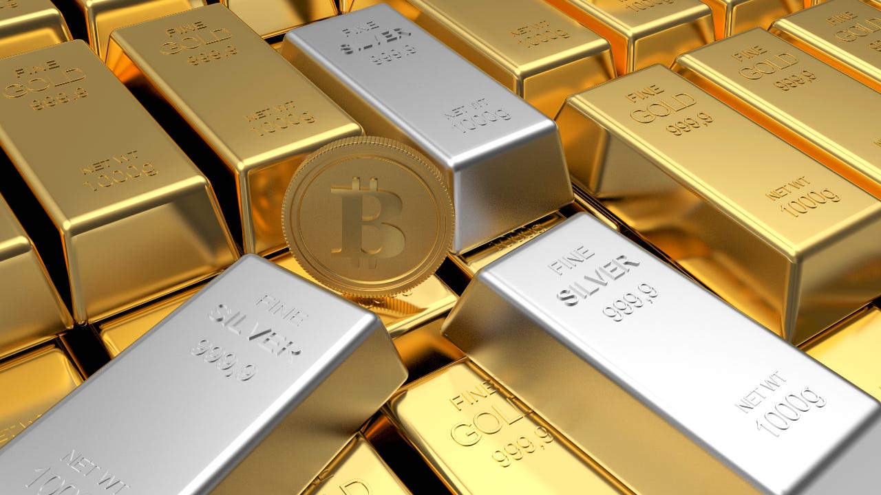 Gold and silver bars with a golden Bitcoin