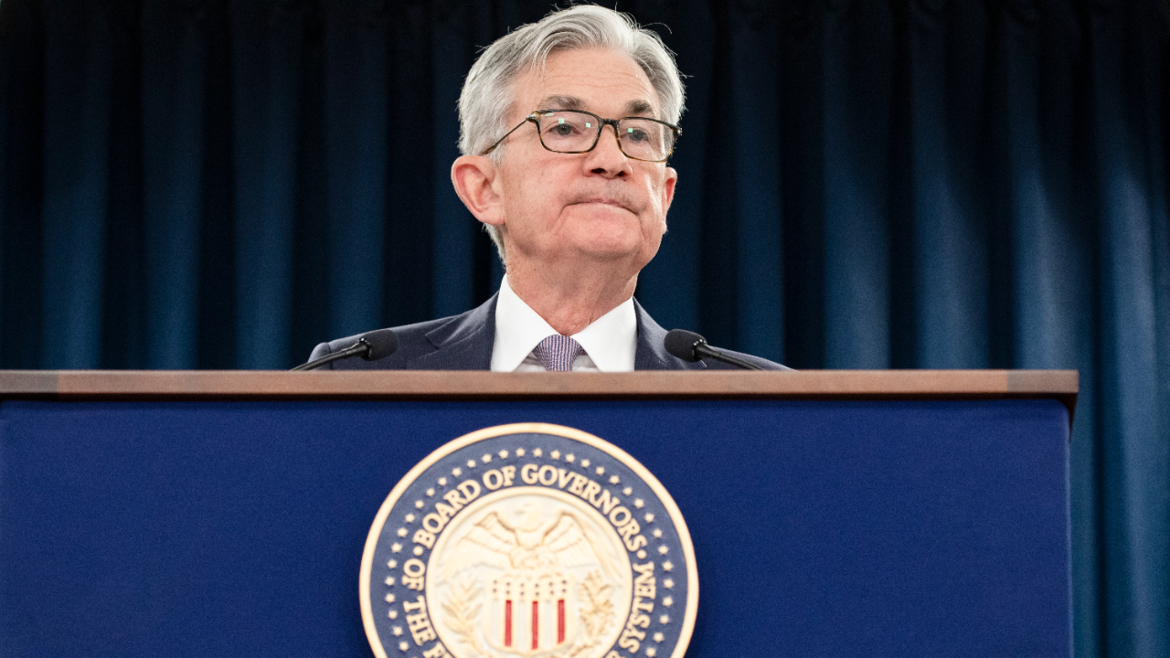 Federal Reserve Chair Jerome Powell speaks with journalists at a post-meeting press conference