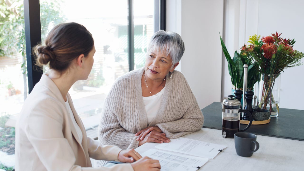 Woman meets with financial advisor