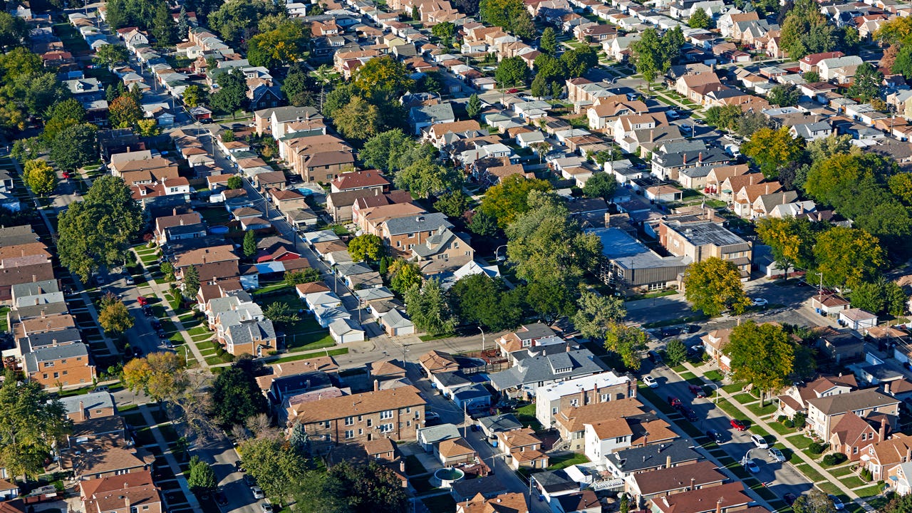 Aerial cityscape of rows of suburban housing in Chicago