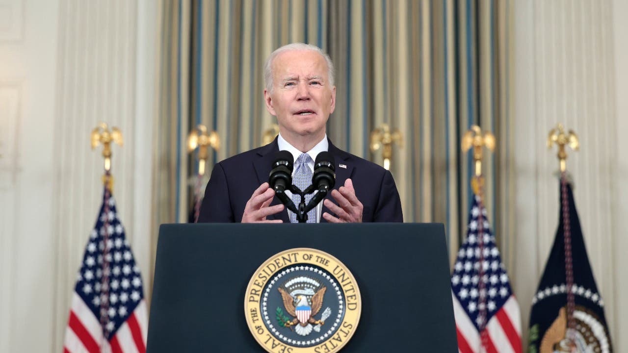 President Biden speaks at a podium