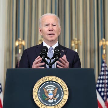 President Biden speaks at a podium