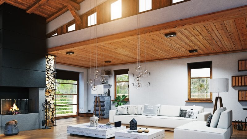 A living room with a drop ceiling