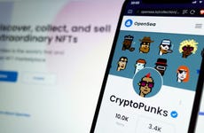 The OpenSea phone app shows various CryptoPunks NFTs