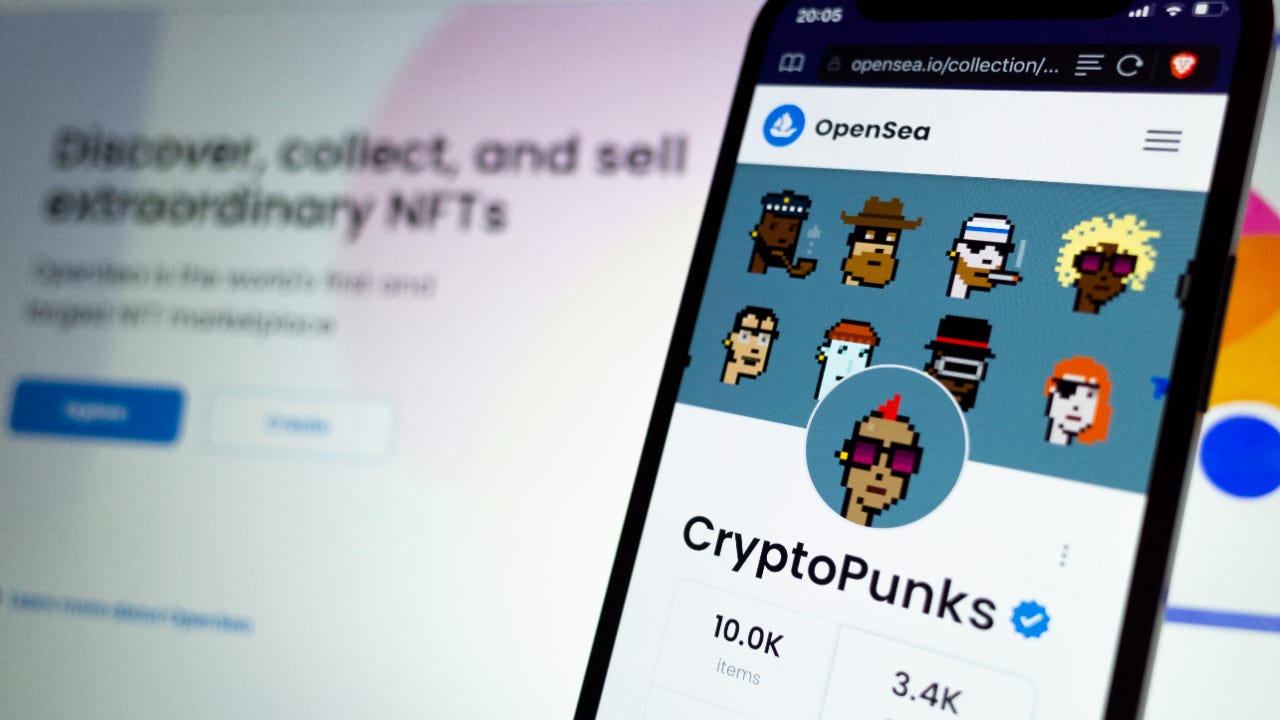 The OpenSea phone app shows various CryptoPunks NFTs