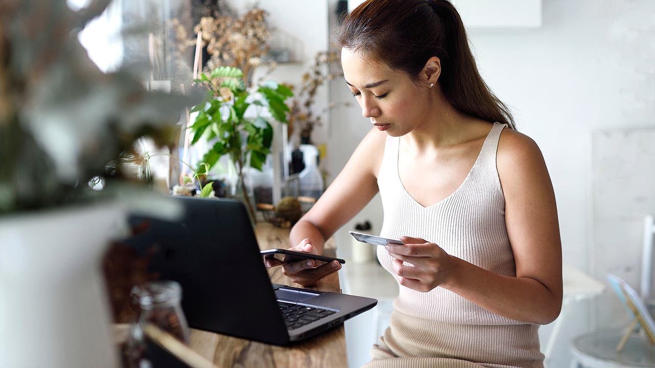 woman online shopping at home