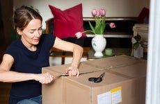 woman opening a package