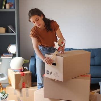 Packing away items in boxes