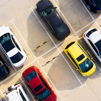 cars parked in an outdoor lot