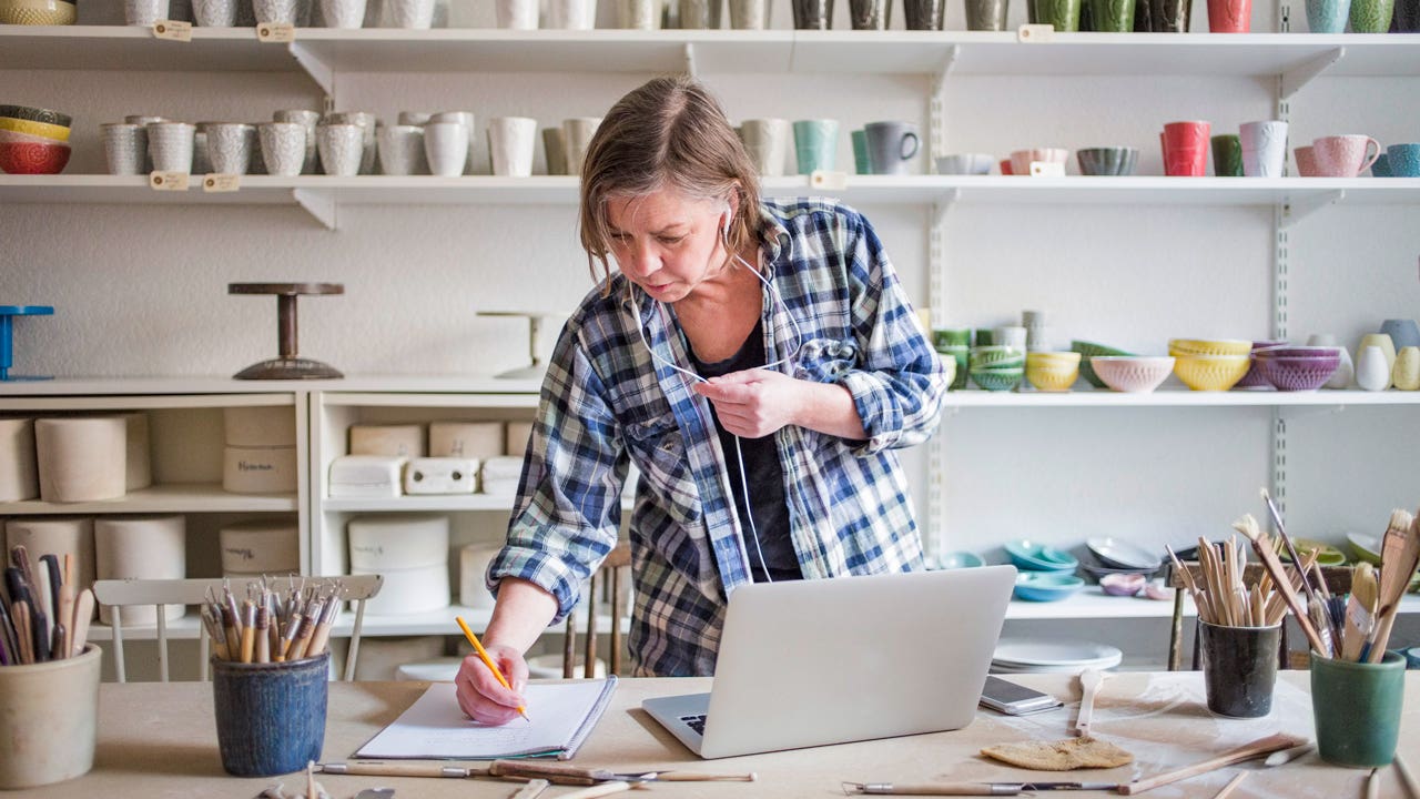 woman working in her pottery studio