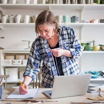 woman working in her pottery studio