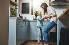Parent and child in a kitchen