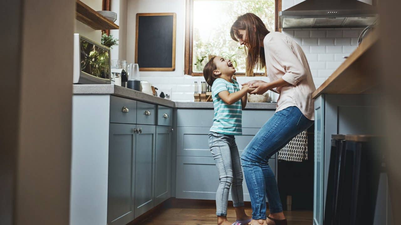 Parent and child in a kitchen